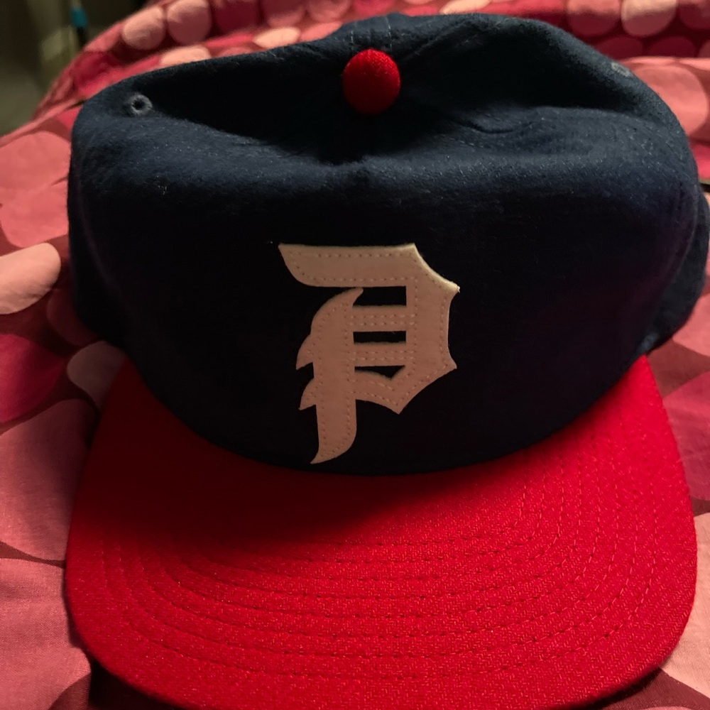 Primitive strap back hat